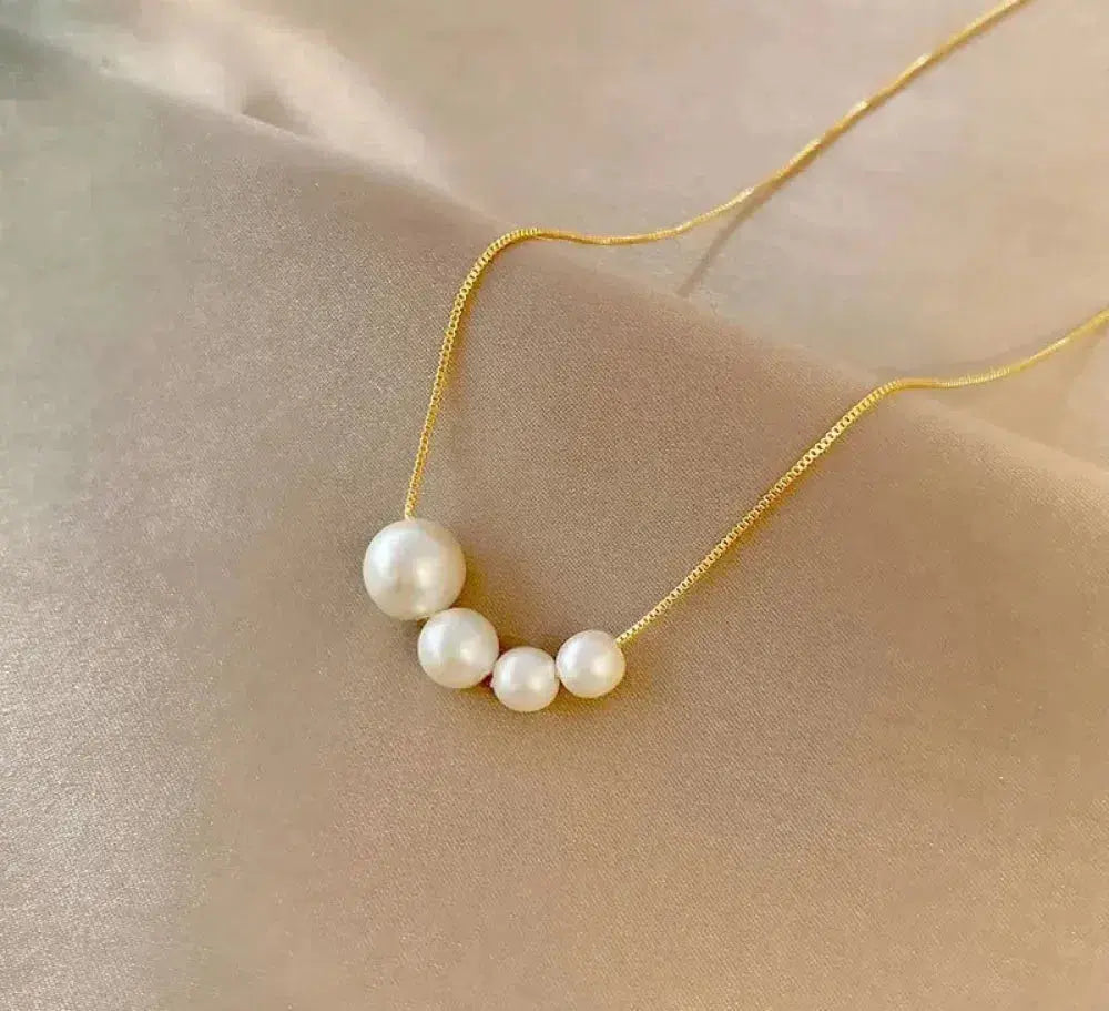 Collar de perlas de agua dulce en oro