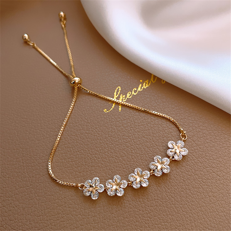 Pulsera de cristal Daisy en dorado