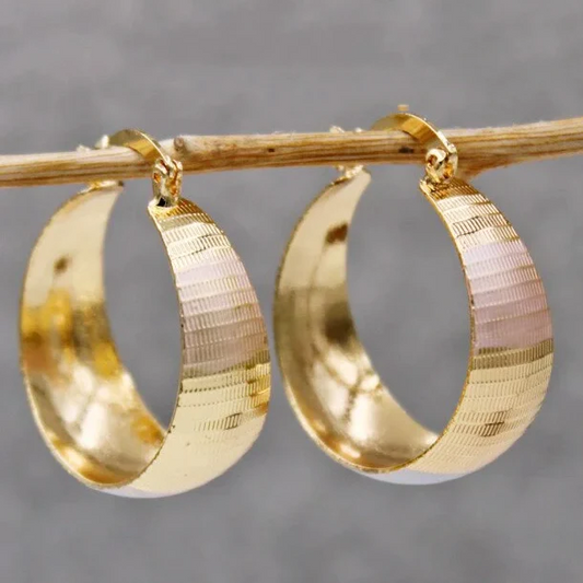 Pendientes vintage dorados redondeados