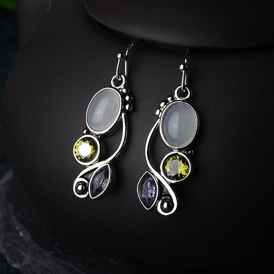 Pendientes vintage de zirconia amarilla y piedra lunar
