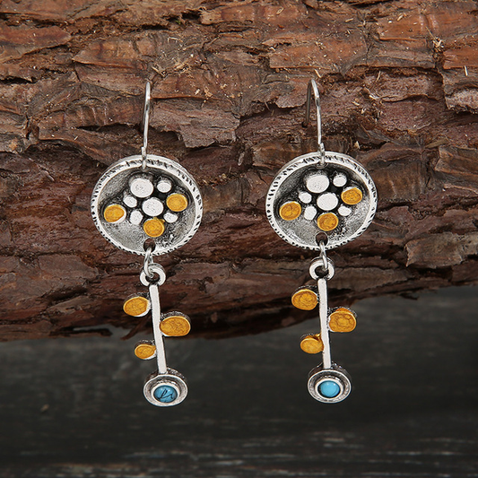 Pendientes vintage plateados y naranjas