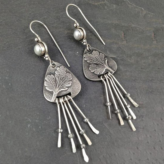 Aretes plateados vintage de medusas