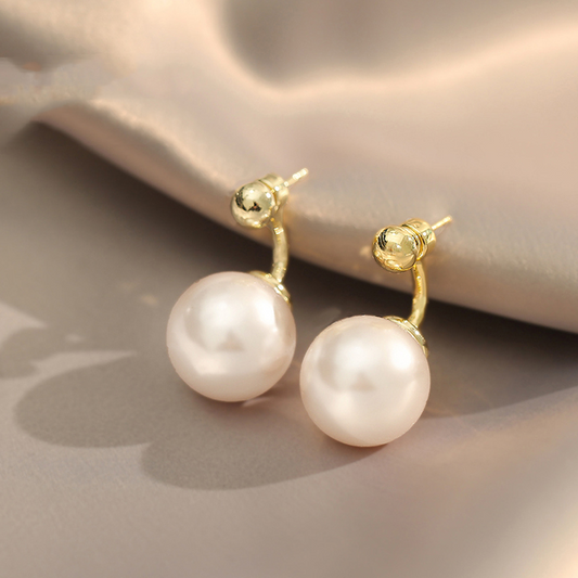 Aretes de perla dorada