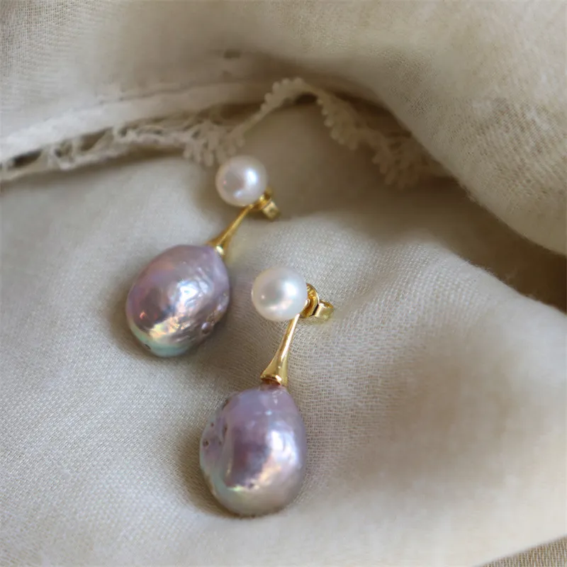 Pendientes elegantes de perla morada