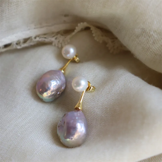 Pendientes elegantes de perla morada