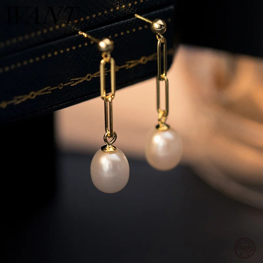 Pendientes vintage con perlas colgantes