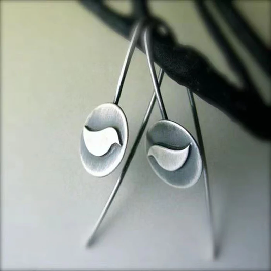 Pendientes vintage de plata con diseño de ave