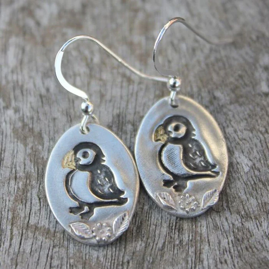 Pendientes de plata con loro vintage