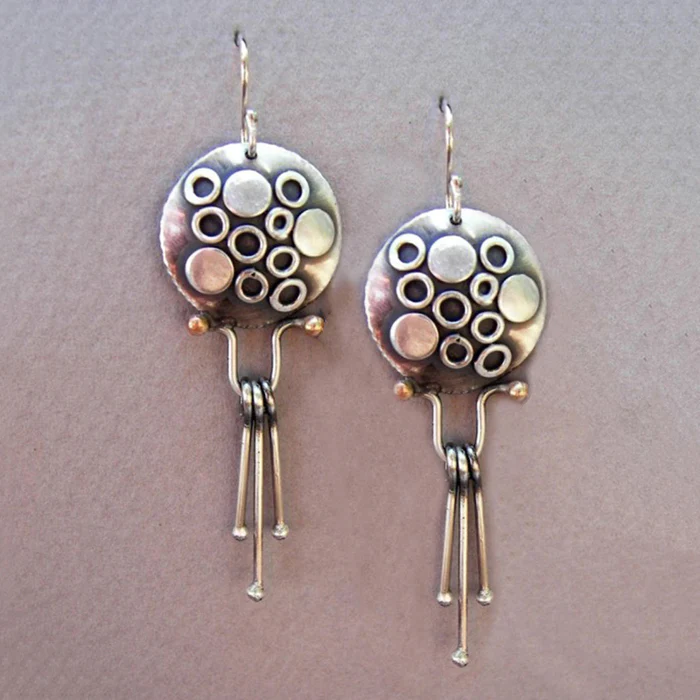 Pendientes vintage de plata con medusa