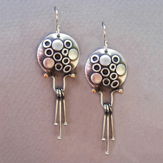 Pendientes vintage de plata con medusa