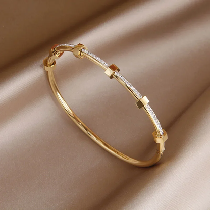 Pulsera dorada brillante