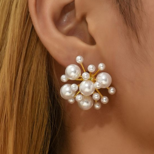 Aretes de lluvia con perlas elegantes