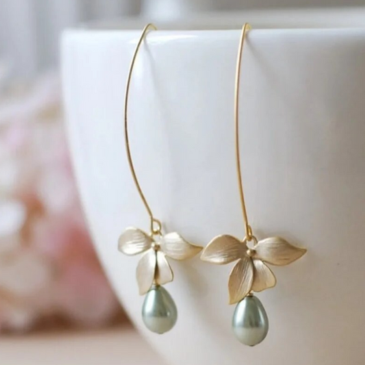 Pendientes elegantes de perlas de oliva colgantes