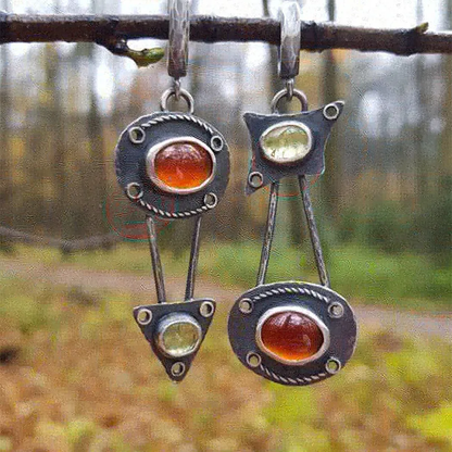 Pendientes vintage mecánicos con incrustaciones de piedra
