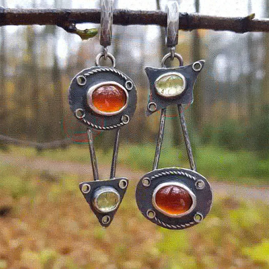 Pendientes vintage mecánicos con incrustaciones de piedra