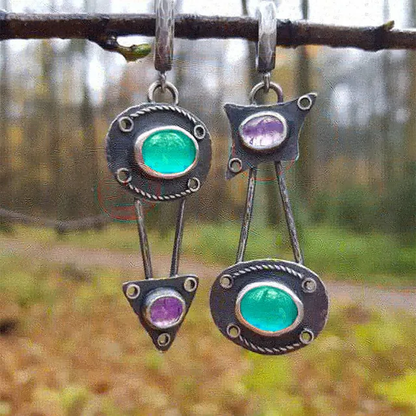 Pendientes vintage mecánicos con incrustaciones de piedra