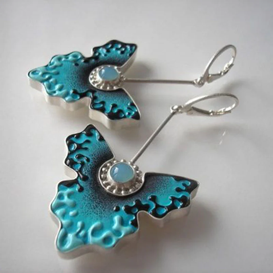 Aretes vintage de mariposa con esmalte azul