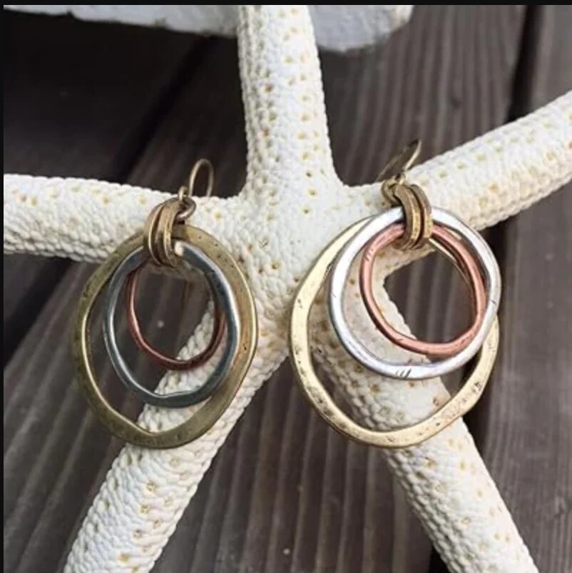 Pendientes circulares vintage en oro y plata