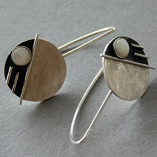 Aretes vintage redondos de opalo blanco