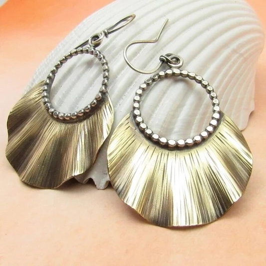 Pendientes de cortina dorados vintage