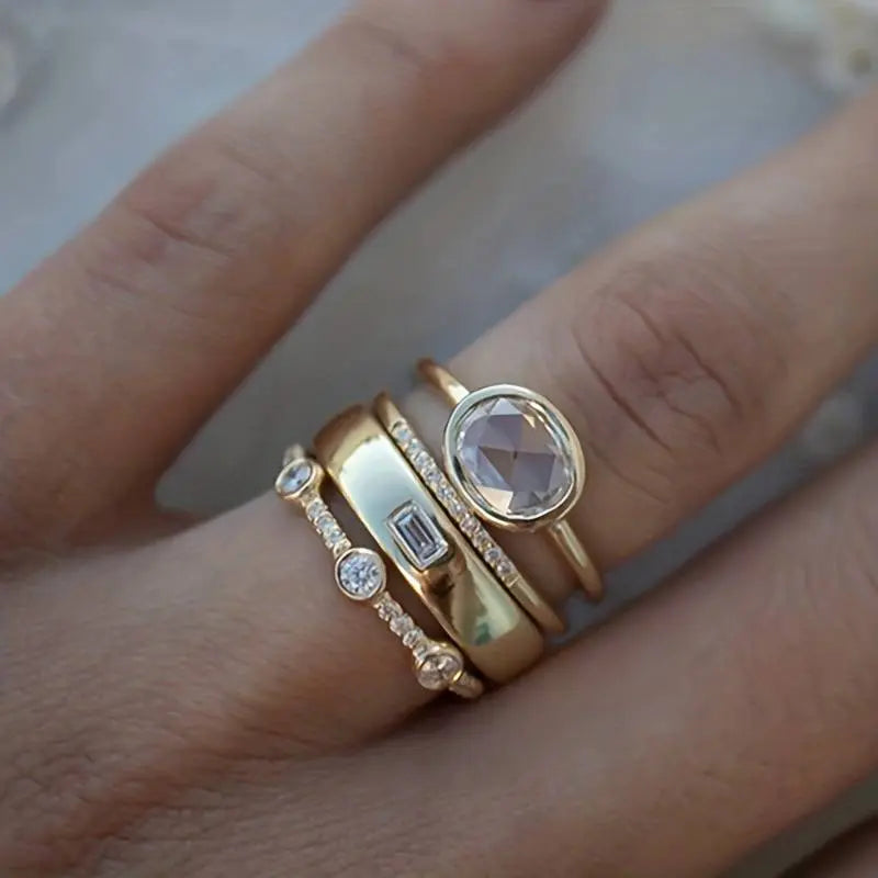 Juego de anillos vintage de oro y zirconia
