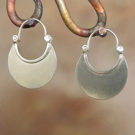 Pendientes vintage plateados con acabado en plata