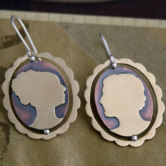 Pendientes redondos de cara plateada vintage