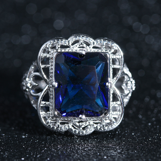 Anillo de plata hueca con circón azul vintage