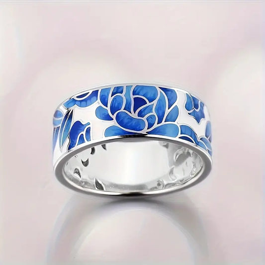 Anillo vintage de plata con flor de esmalte azul