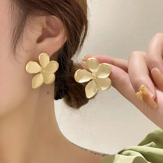 Aretes vintage de flor dorada