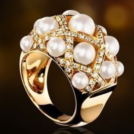 Anillo vintage de oro con perla y zirconia