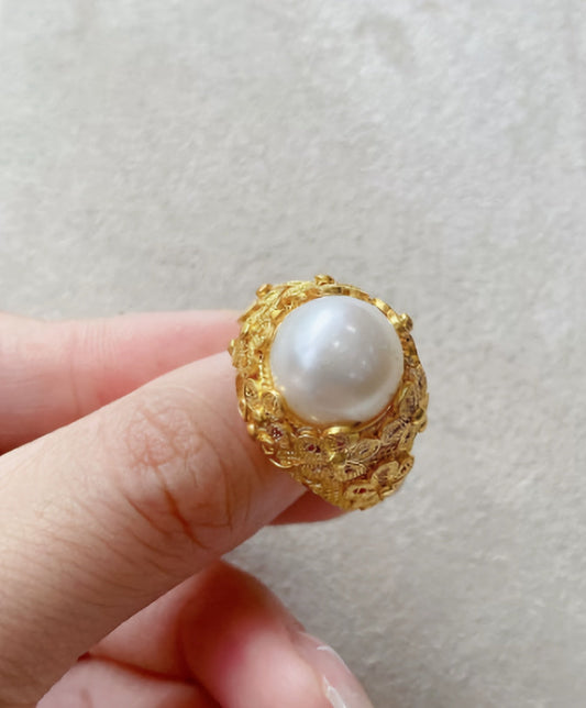 Anillo de oro con perla