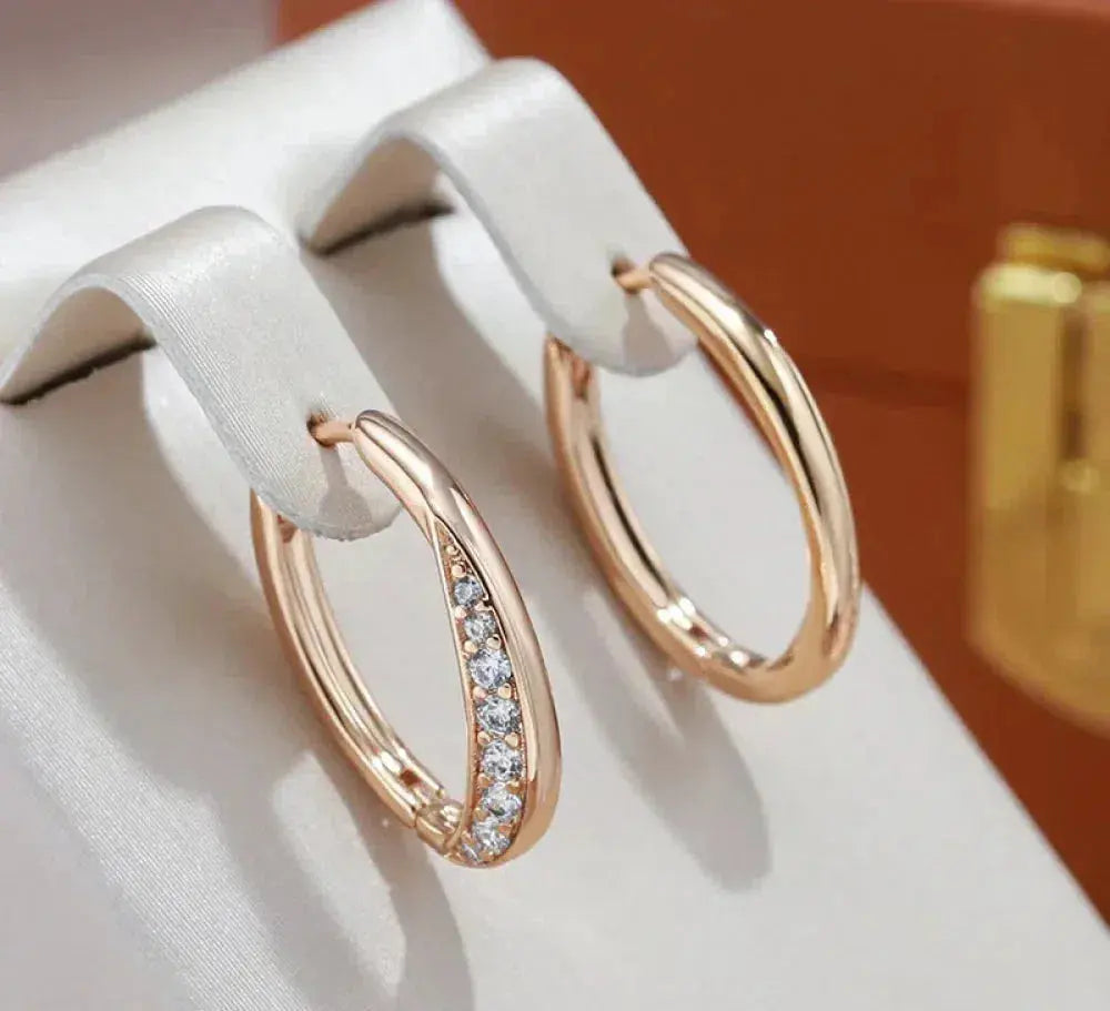 Aretes de aro dorados de lujo