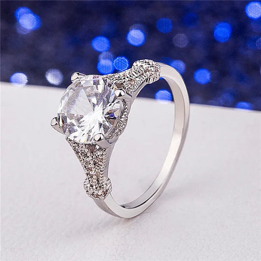 Anillo de plata y vidrio blanco vintage